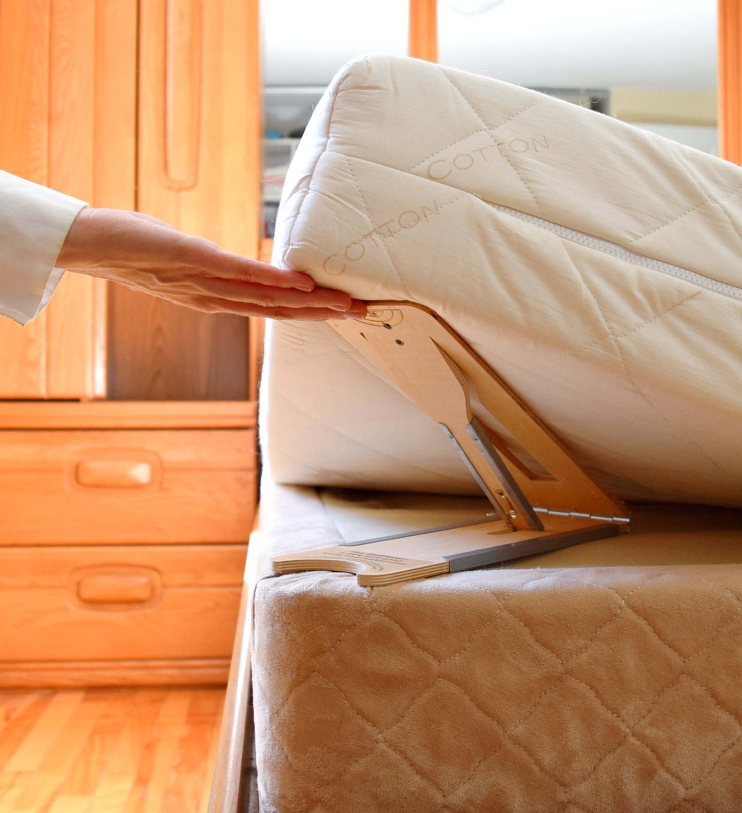 The BedMaker on a bed.